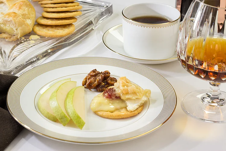 Ginger sugar walnuts, green anjou pears and raspberry baked brie on a cracker