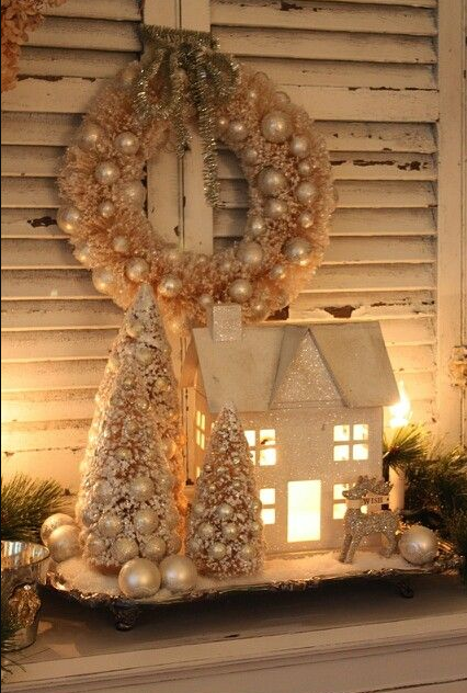 Christmas vignette in silver lit house, trees and a reindeer source