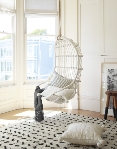 Ceiling white pod swing from Serena & Lily