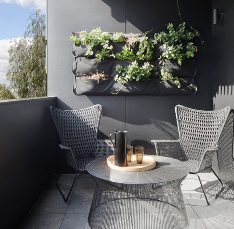 vertical wall garden on balcony source
