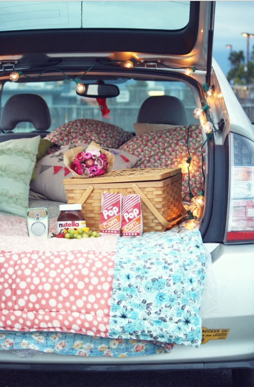 Picnic in a hatch-back car source