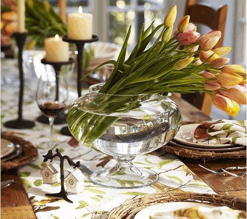 Tulips in a glass vase centerpiece from Country Living