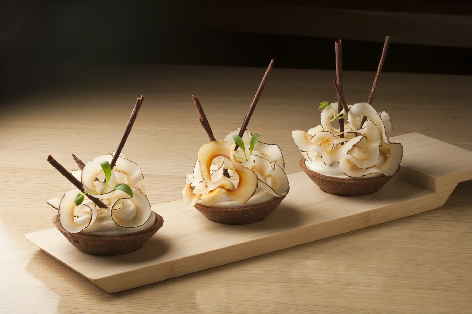 Trio of Coconut Cream Pies w/ Toasted Coconut Chips