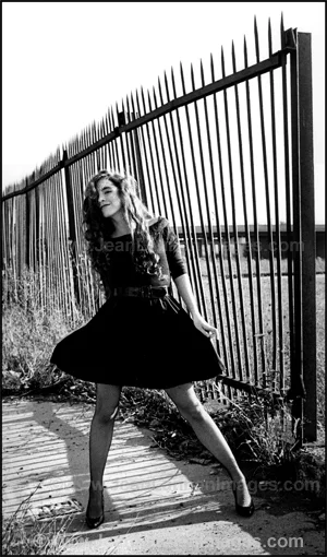 31 HeroGirlFence300.jpg