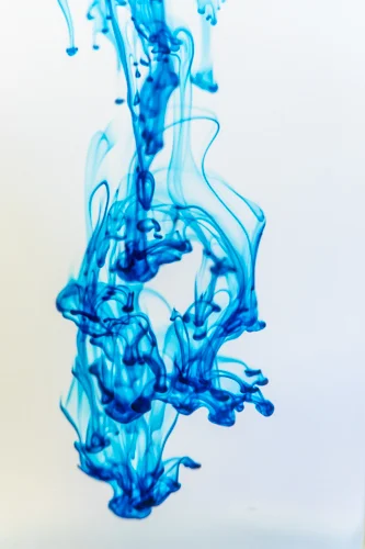 Food coloring flowing through water