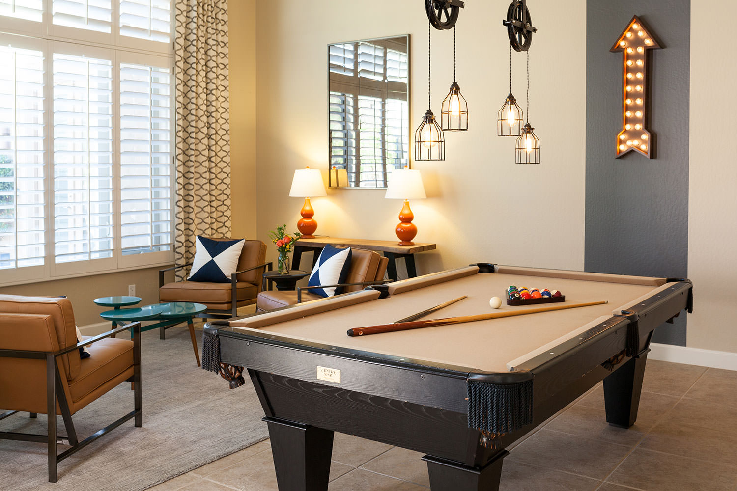 Create a dynamic recreational area within your home with flexible seating and fun games. Image: James Stewart