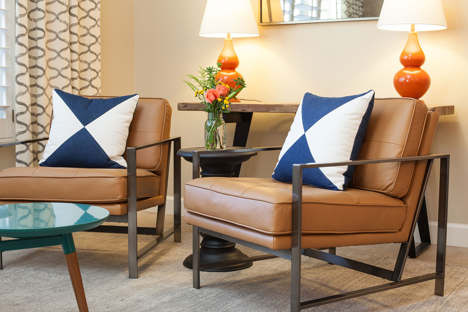 Mid century inspired furniture gives a vintage retro feeling to this space. Image: James Stewart