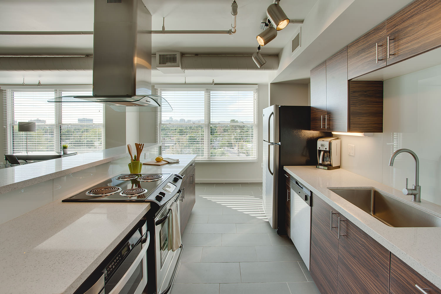The kitchen is the heart of the home and in this modern Phoenix loft it is where you want to be. The warm texture compliments the cool environment to create a space that is the perfect place to prepare for your next dinner party.