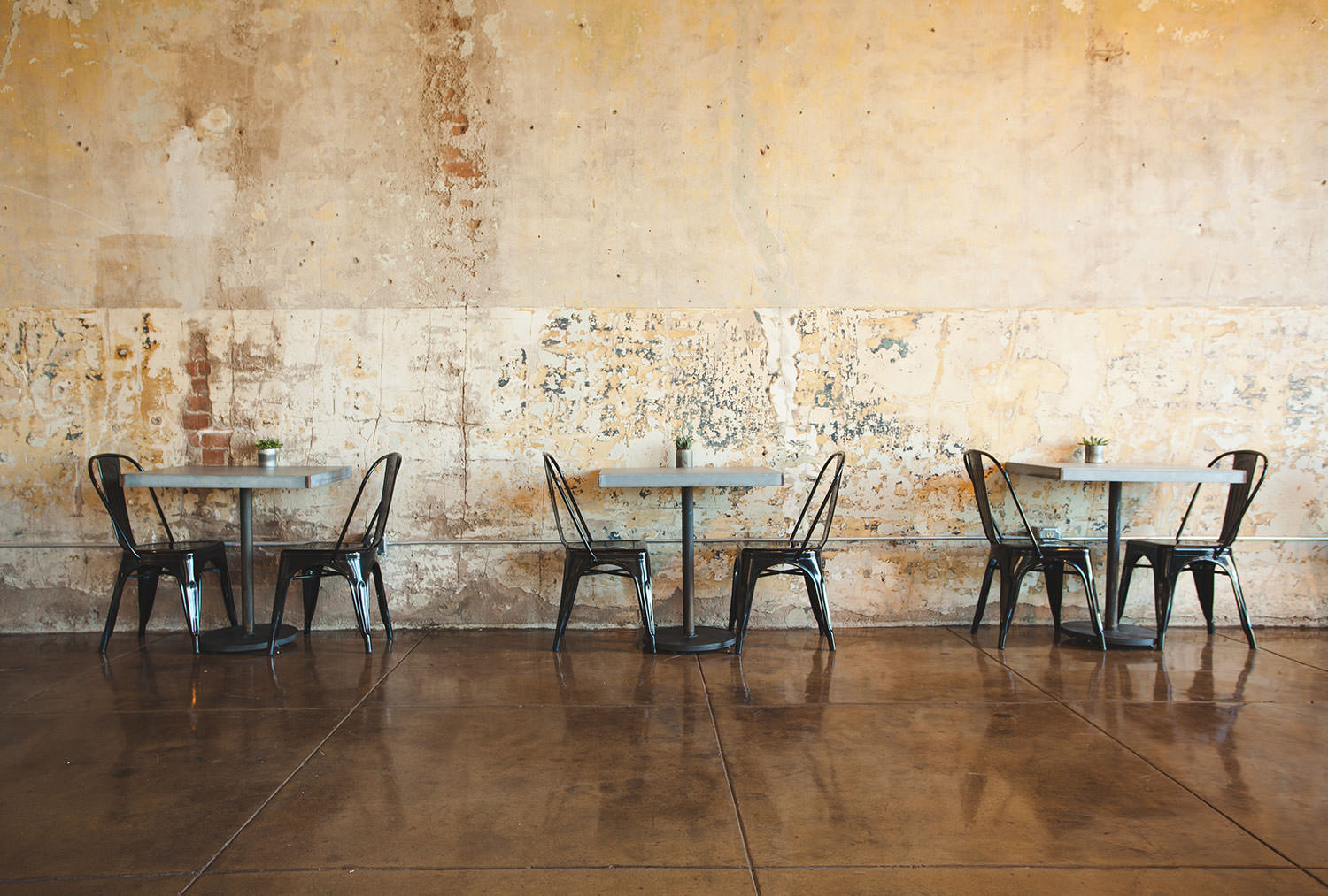 Keeping the original wall in this industrial warehouse kept some of the history and charter that makes this building so charming.