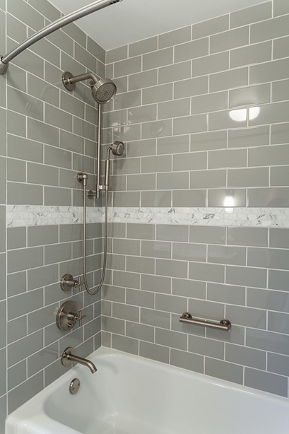 Tile Shower With Marble Detail