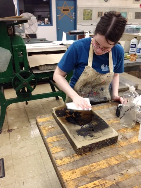  With the coating removed, the image needs to be revived with fresh grease. After fulling covering the stone, I use a handheld fan to dry the grease. 
