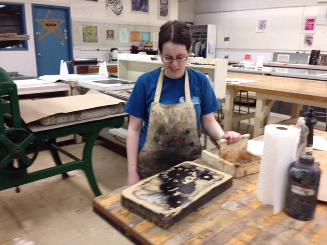  Once printing is done, the stone is rolled with ink a few times to help prepare the image for storage. When the stone and image are properly cared and stored for the image can be printed decades, even a century later. The print on the wall just abov