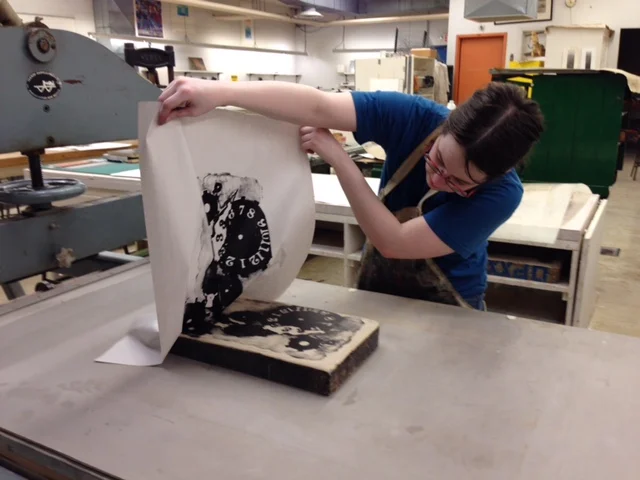  After careful peeling, I have a fresh print of Gears of Time. The print is set aside to dry on a rack while I prepare the stone for storage. 