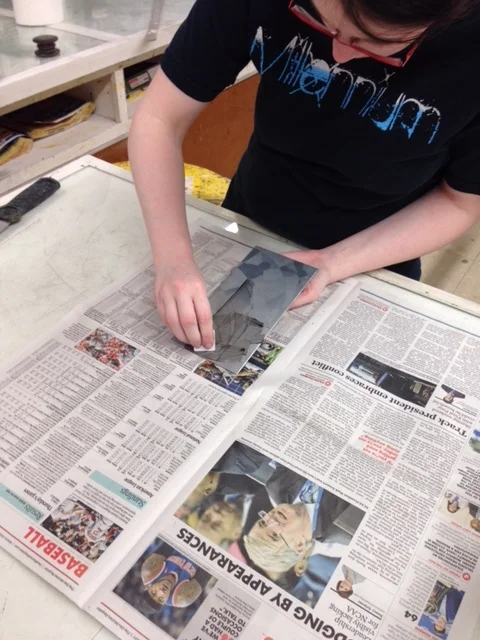  I continue to add ink to the plate with small squares of matte; pulling the ink into the lines on the plate. 