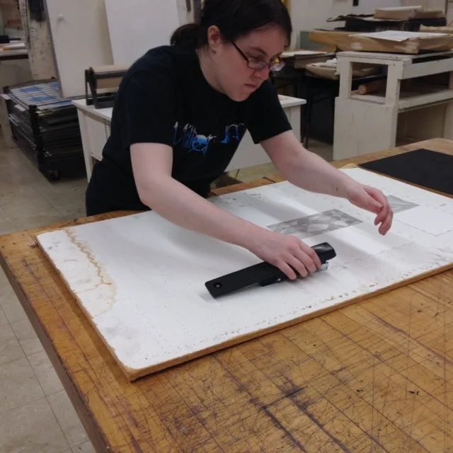  The second to last step is to staple the print to a flat surface to allow the print to dry completely flat. After the print is dry (I typically wait a day), I pull the print from the board and remove the staples. The last step is to trim the print d