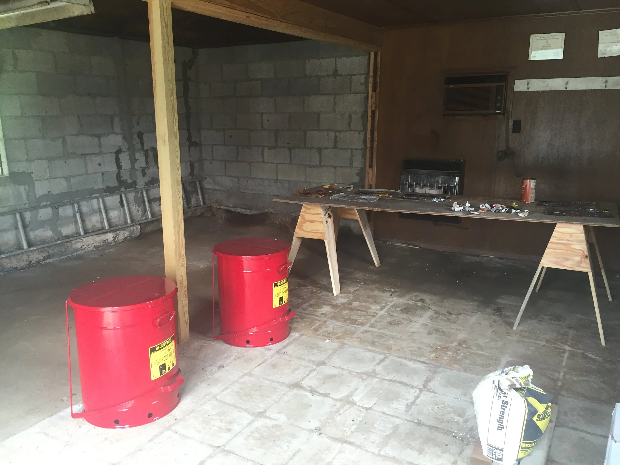  Safety is a BIG consideration here at On Track. These oily cans are located in a separate building. Paper towels, paint tubes, disposable pallets, cans with scraped paint, are all left here to thoroughly dry. I can then dispose of at local convenien