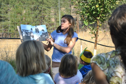 Annie reading "Market to Market" to the Kindergartners.
