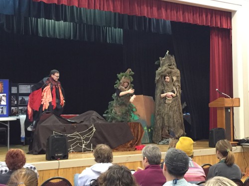 Douglas Fir (right) explaining to Western Hemlock (middle) how a volcanic eruption (left) can help forests by depositing nutrient filled volcanic ash.