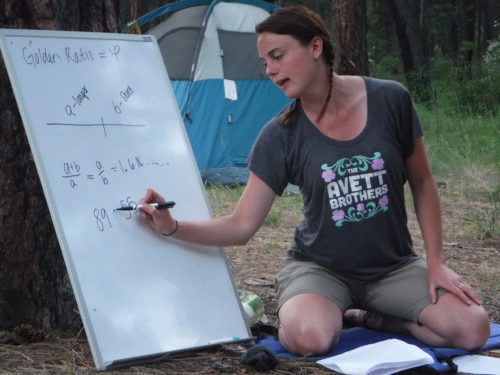 Emily Baronich showing how interconnected math and the natural world is through the Fibonacci sequence.