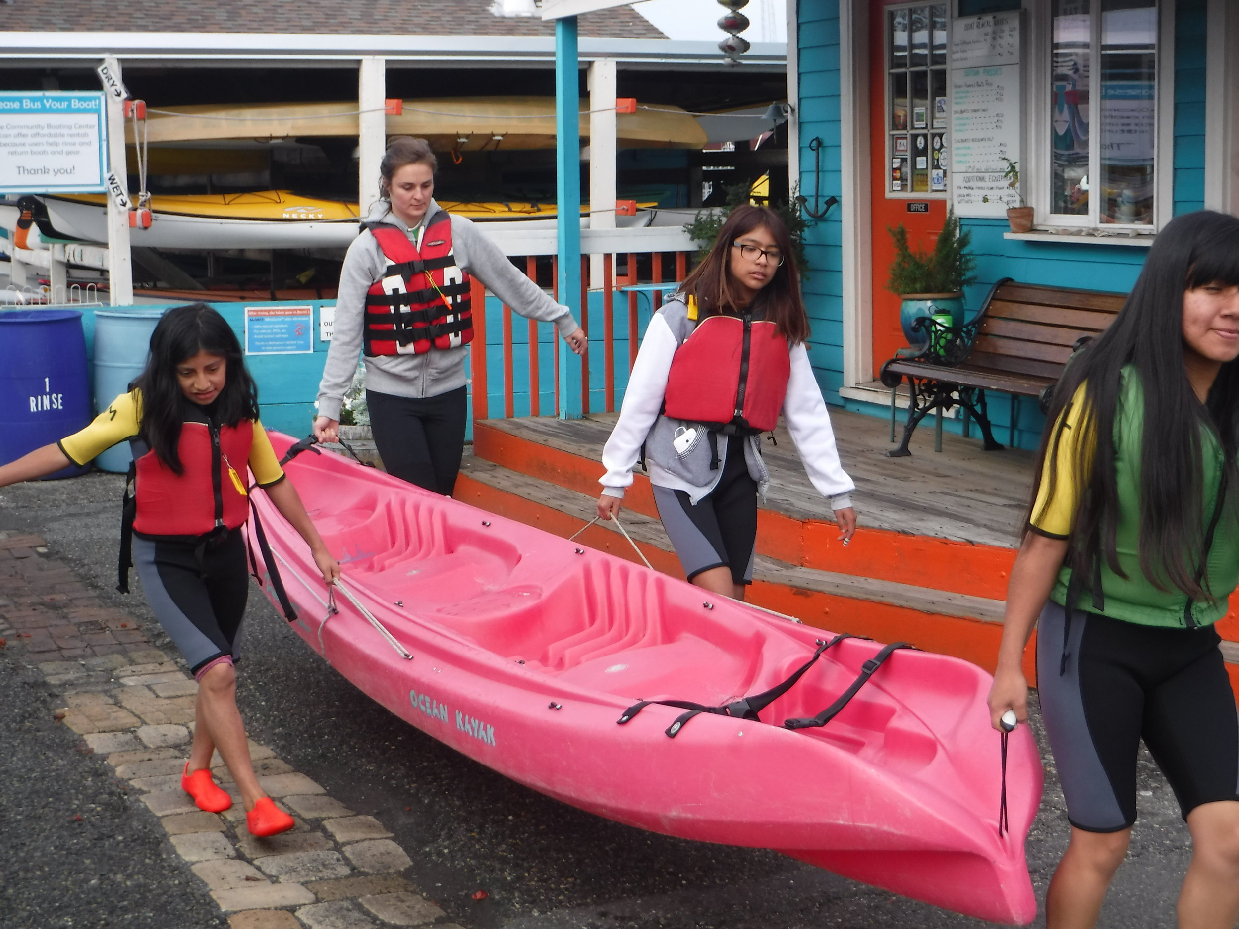 Carrying our kayaks to shore