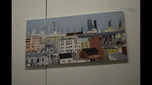 James Rose painting in his studio