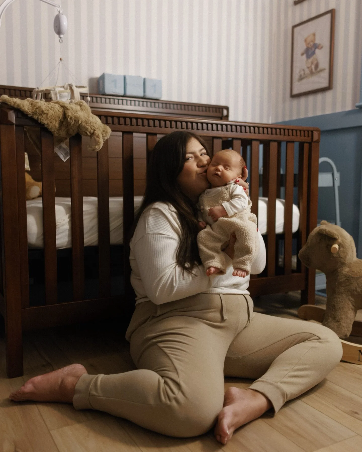 Motherhood in its quiet, beautiful moments. The little hugs, the tiny hands, and the love that fills every room.