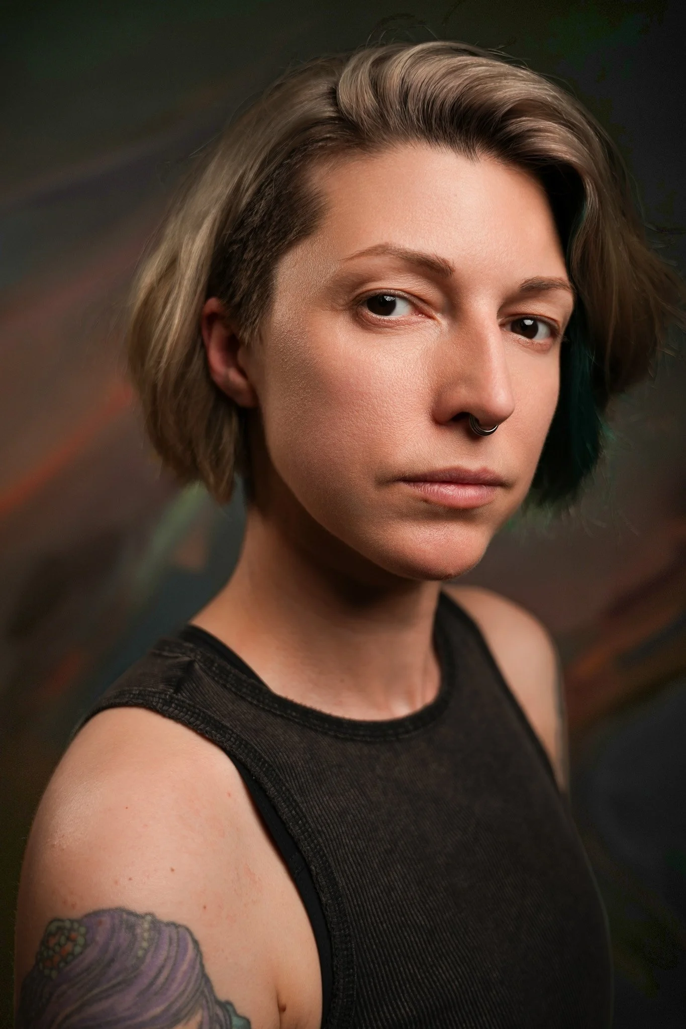 Laura Davey (they/them)