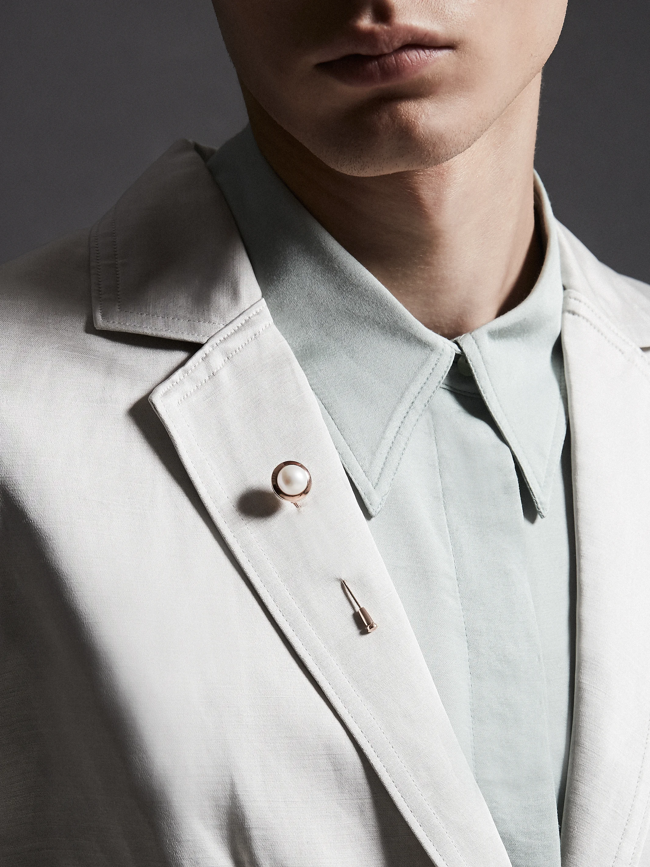 State Property Unfold Homme Portmanteau Lapel Pin.jpg