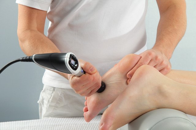 Shockwave Therapy being used to treat a foot