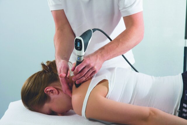 Shockwave Therapy at the back of the shoulder