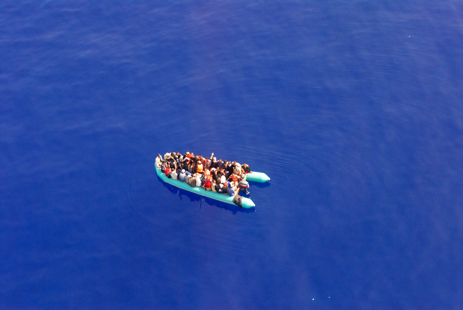 Sicily - Illegal Immigration - View of a small immigrant vessel 