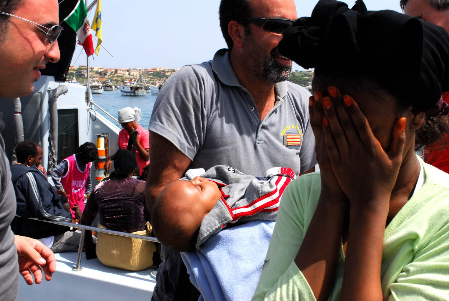 Sicily - Illegal Immigration - Muslim woman and son 2