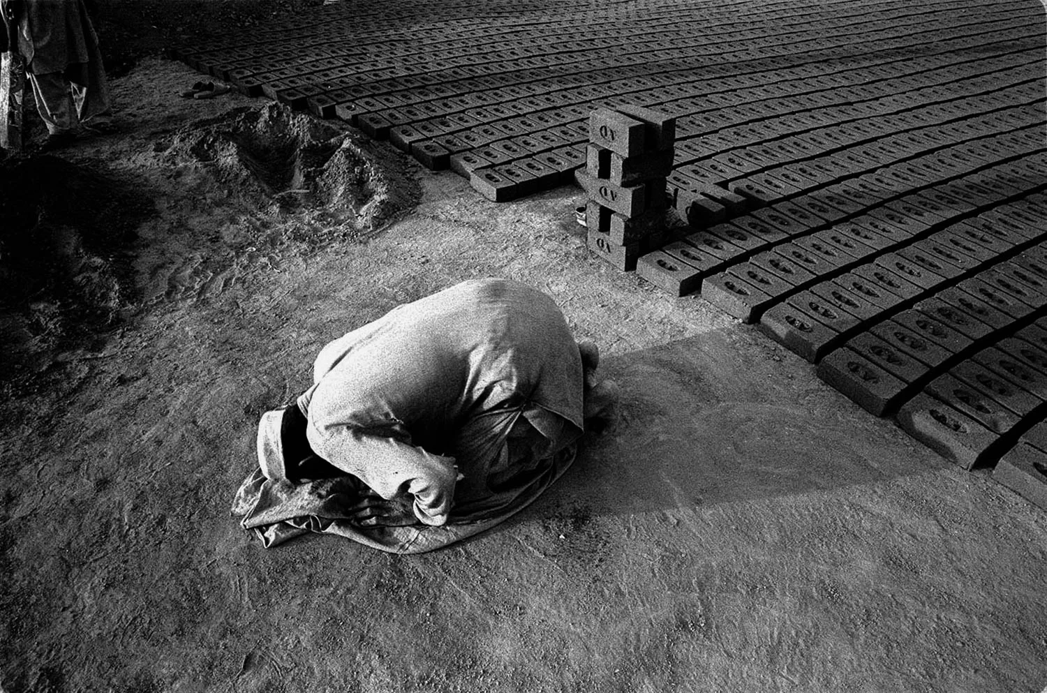  For thousands of Afghan refugees, the exodus from their country, towards a better condition of living, turned to be just the beginning of a new struggle for life.Without any money, without job, and strangers in a hostile Pakistan, the afghan families had no other choice than labouring thirteen hours a day in the bricks factories spread all over the country.One family, two thousand seven hundred bricks to be produced by hand every day.A poor salary as a meagre consolation   of their efforts, just enough to survive, serious diseases caused from the lack of hygiene, and kids from just the age of three years old starting a life without hope, forced to labour together with their parents to reach the daily target; thousands of heavy bricks.Stolen childhood is called, stolen childhood I have witnessed. 