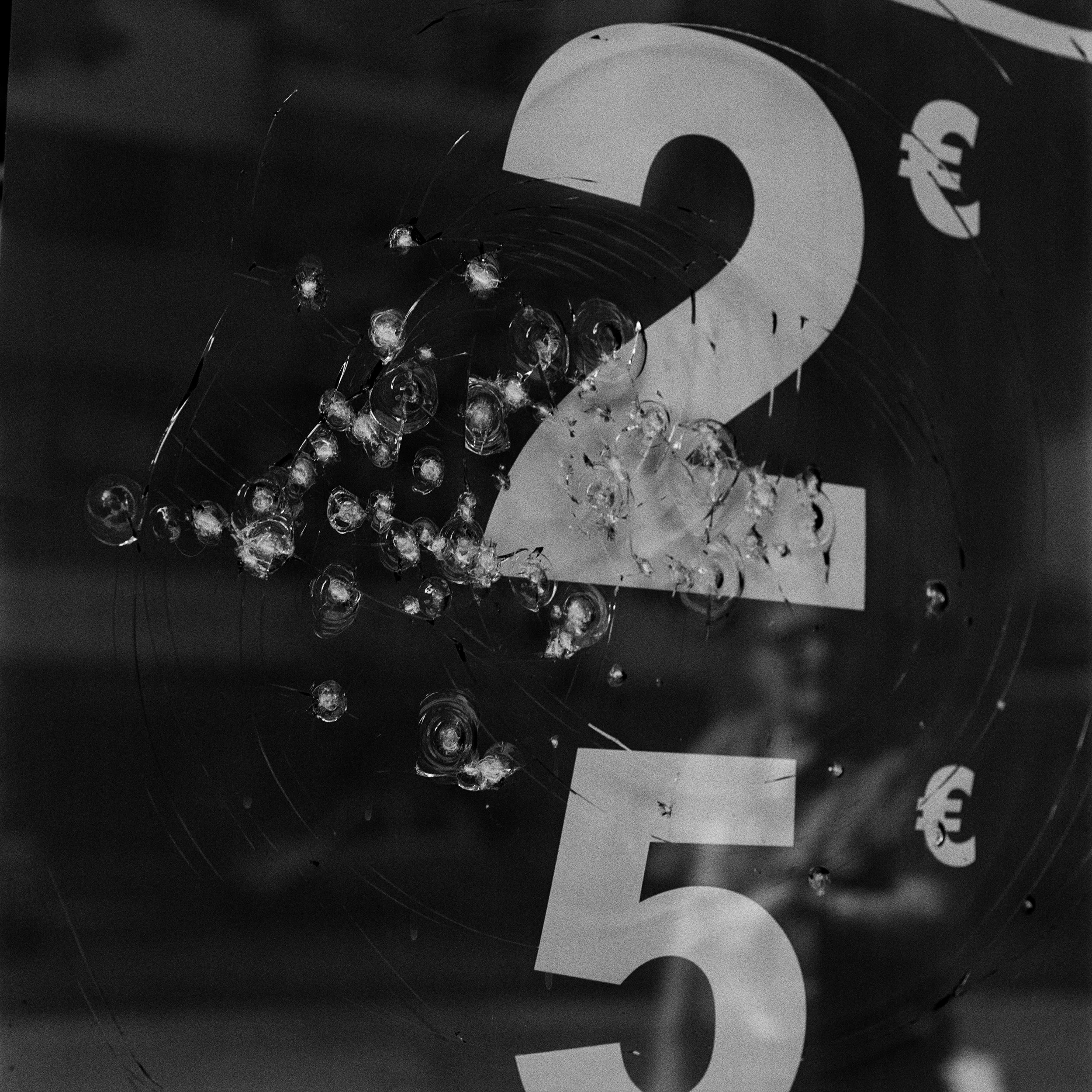  A window riddled with bullets in the heart of Palermo city centre. 90% of business activities in the Sicilian capital pay extorsion money to the mob, despite the increasing successful campaign of Addiopizzo which supports store owners to denounce the racket of extorsion in Palermo. 