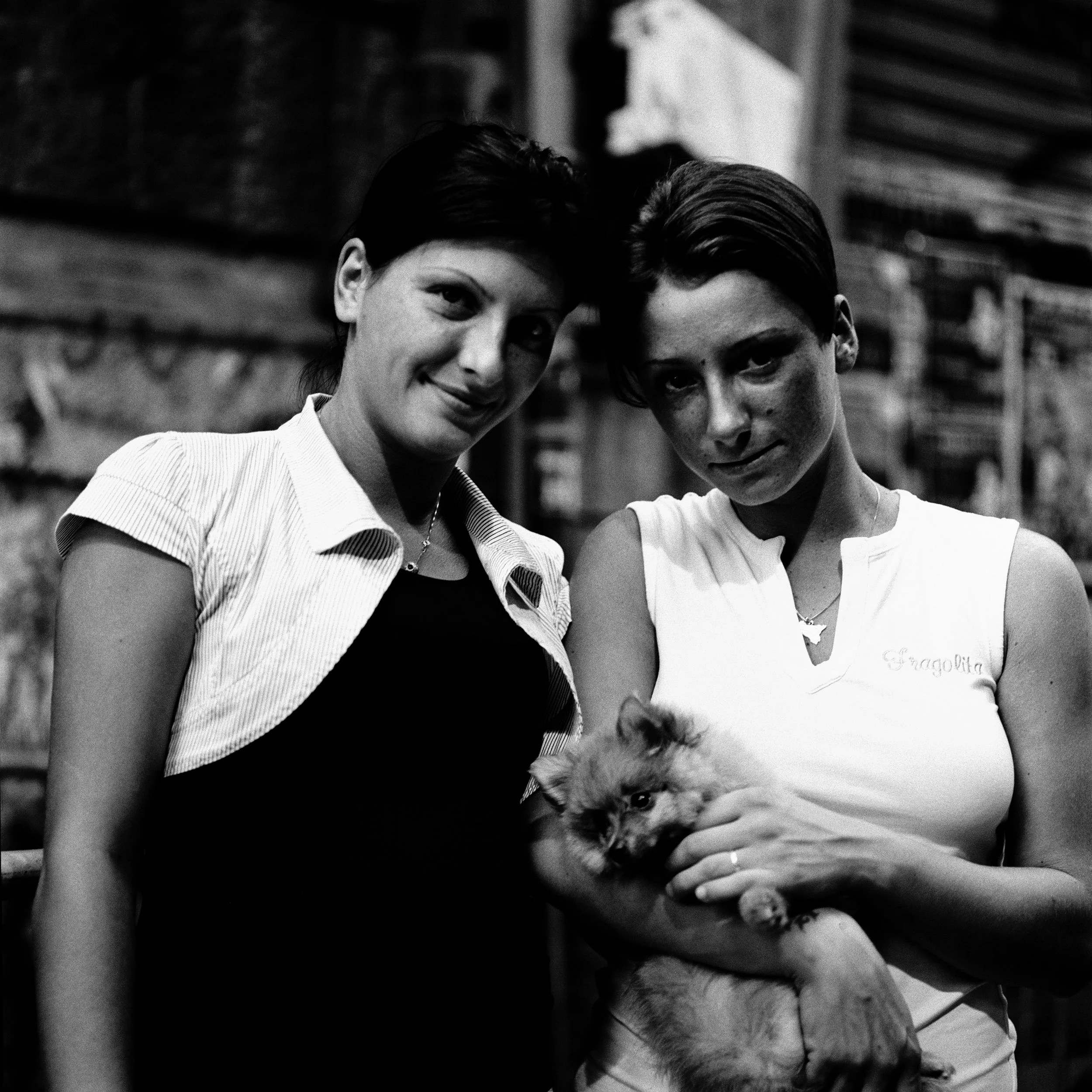  Couple with dog at Vucciria market, Palermo. 