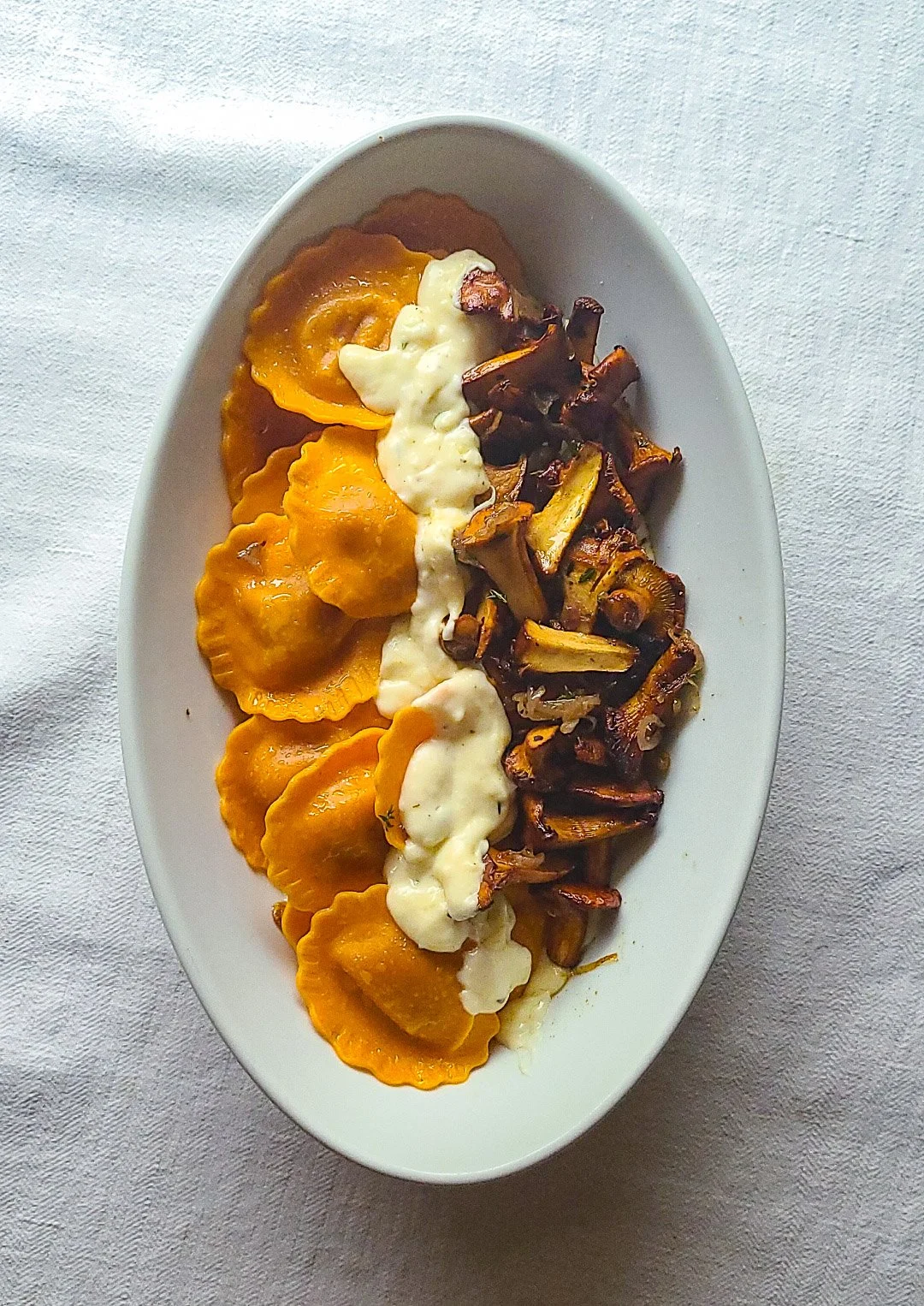 Pumpkin Ravioli in a Béchamel Sauce with Chanterelles