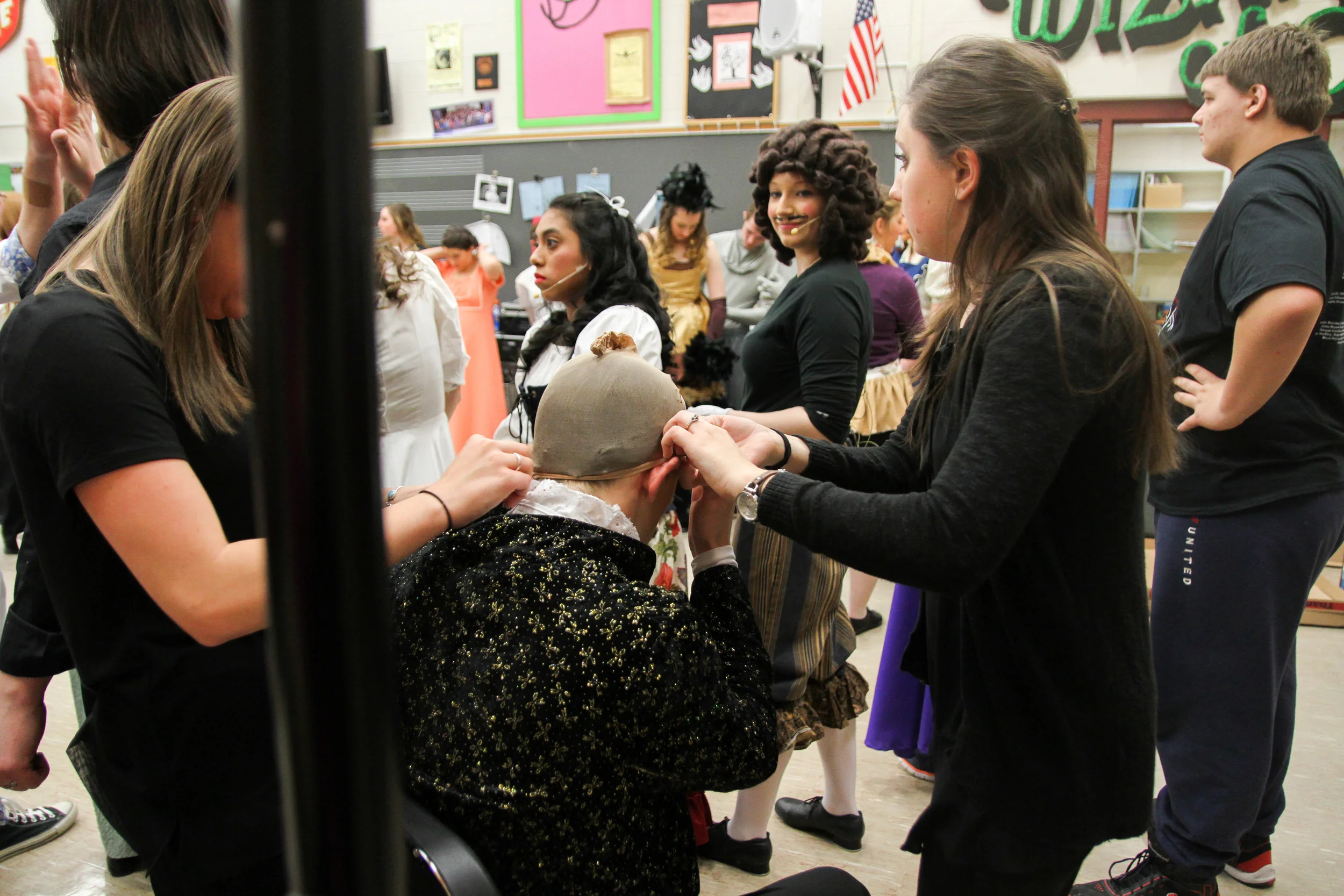 The cast of Cranberry High School’s production of Beauty and the Beast preparing for opening night, of the four night show, for their annual spring musical. The school board was so impressed with last years show, The Wizard of Oz , they gave a donation to Drama club to purchase new costumes as well as new sound equipment for the show.