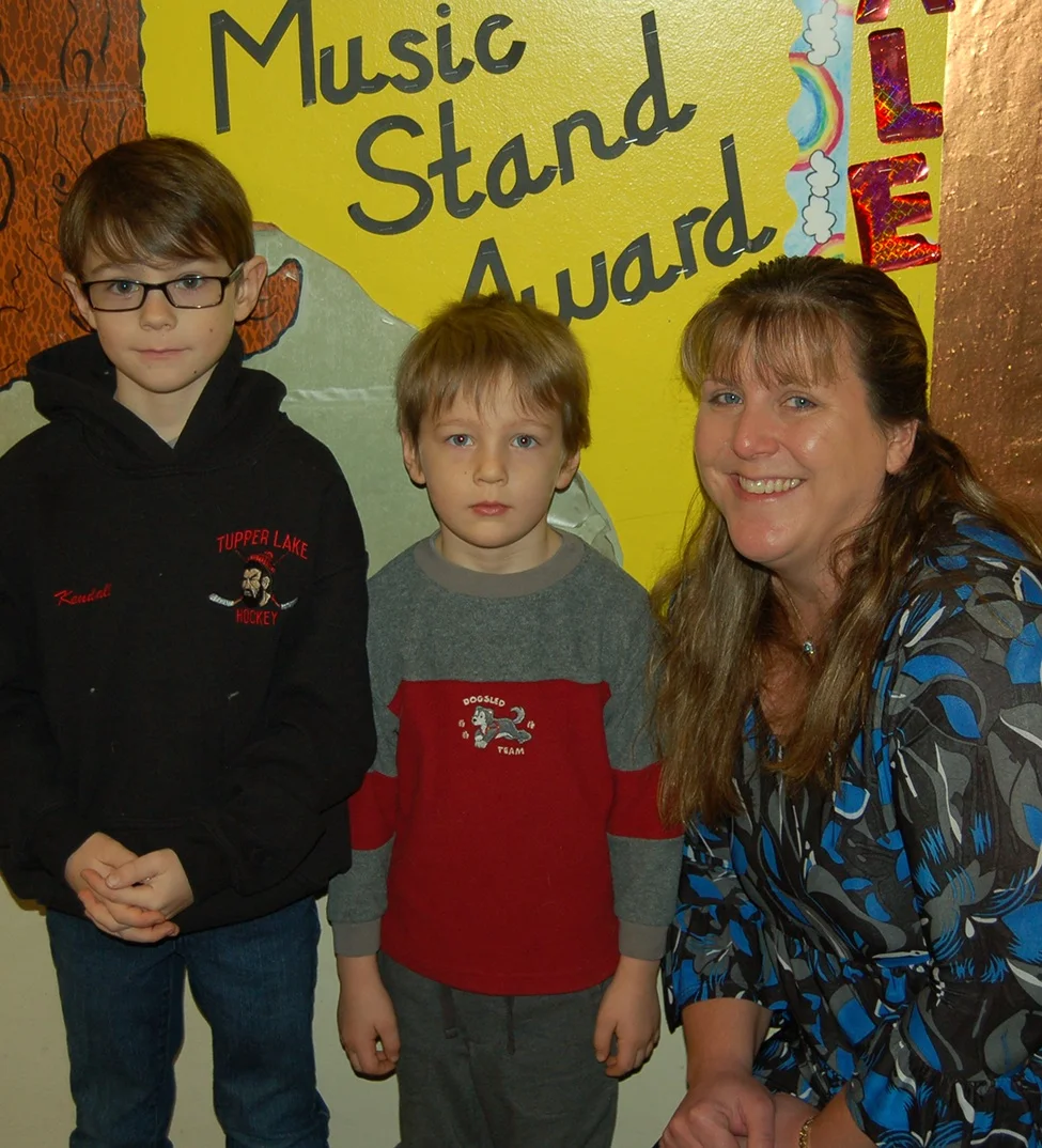Welcome back, kids! New L.P. Quinn Principal Julia Aubrey welcomed two of the first students to arrive back at school Tuesday after the holiday break. With the new principal, who replaced retiring Principal Carolyn Merrihew in September, were third grader Jonah Kendall (left) and his younger brother, Ira, who is a kindergarten student this year. Their mom is fifth grade teacher Michele Kendall. (McClelland photo)