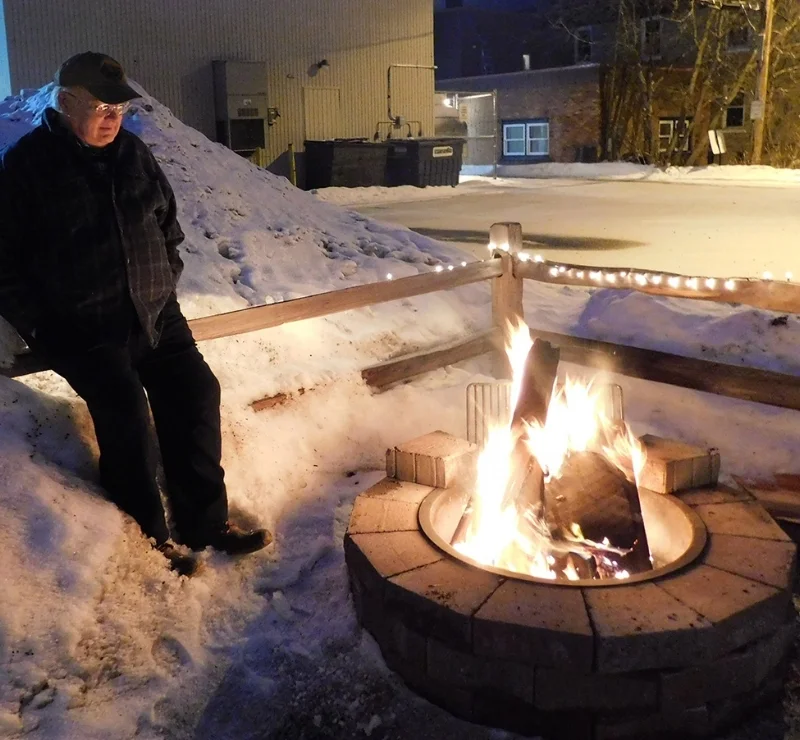 Bruce LaVoy ponders over fire.jpg