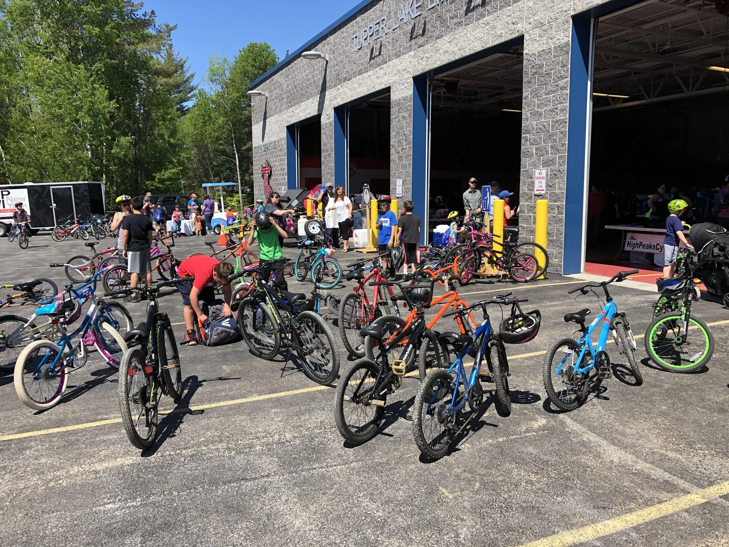 When kids at Saturday's annual Tupper Lake Police Department Bike Rodeo and Celebration of Youth weren't eating or riding their bikes in various road courses, they were probably bouncing, sliding and jumping on three large inflatable attractions constructed on the grounds of the Emergency Services Building, as these photos showed.
