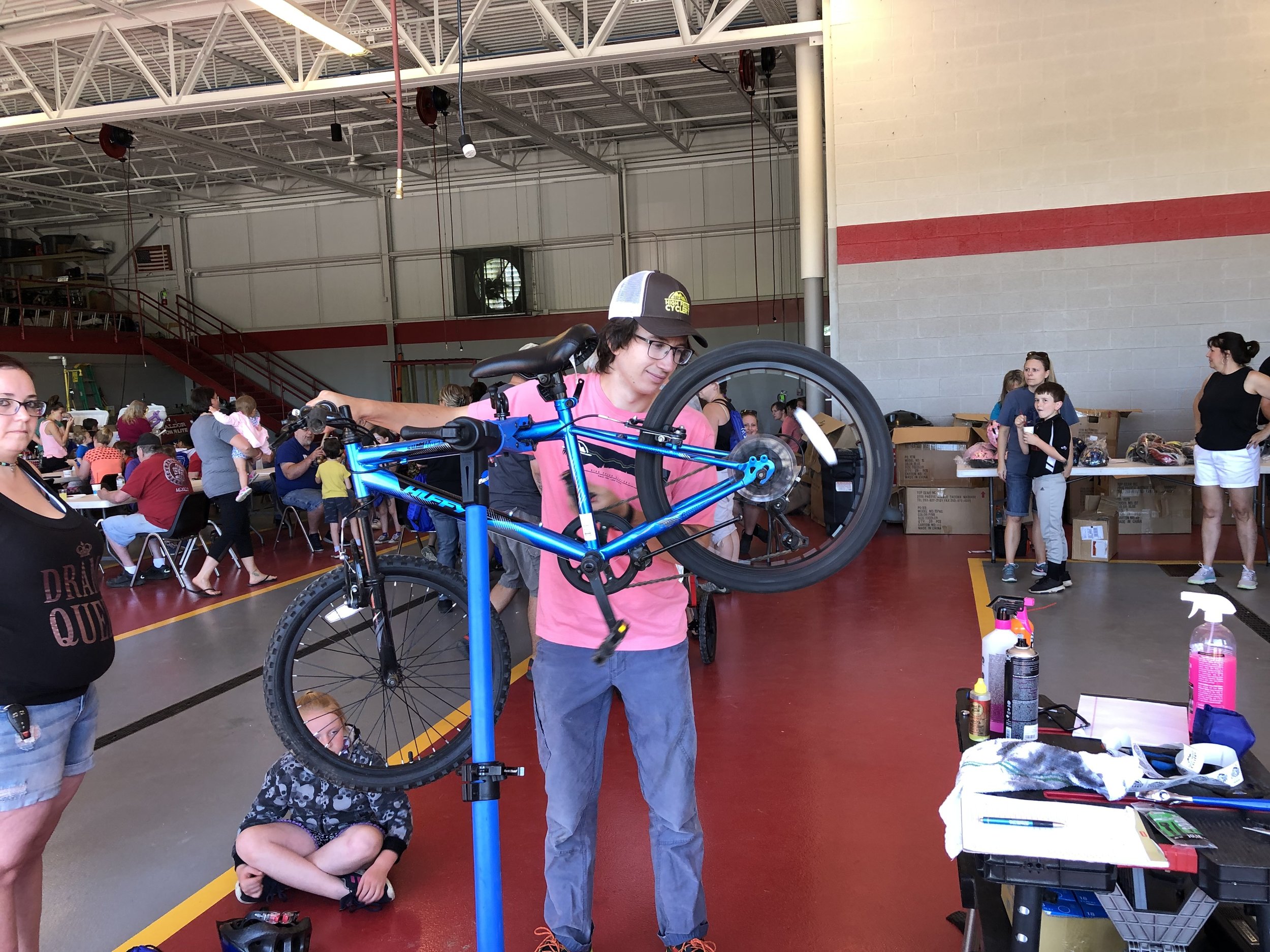   Ben Thompson of High Peaks Cyclery was one of two technicians provided by the Lake Placid-based bike shop to do adjustments and tune-ups for any of the young riders who asked at Saturday's very successful Bike Rodeo and Celebration of Youth.  