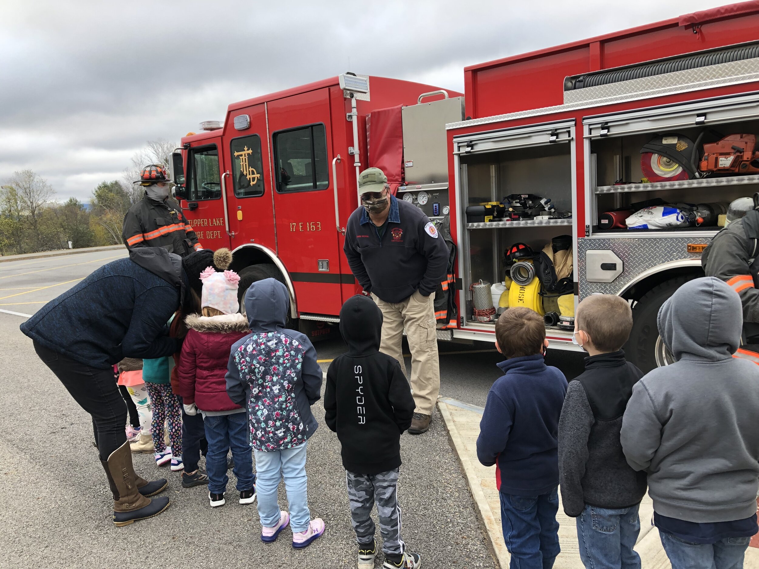   Fireman Mark Picerno asking questions about fire safety to kindergarten students Thursday.  