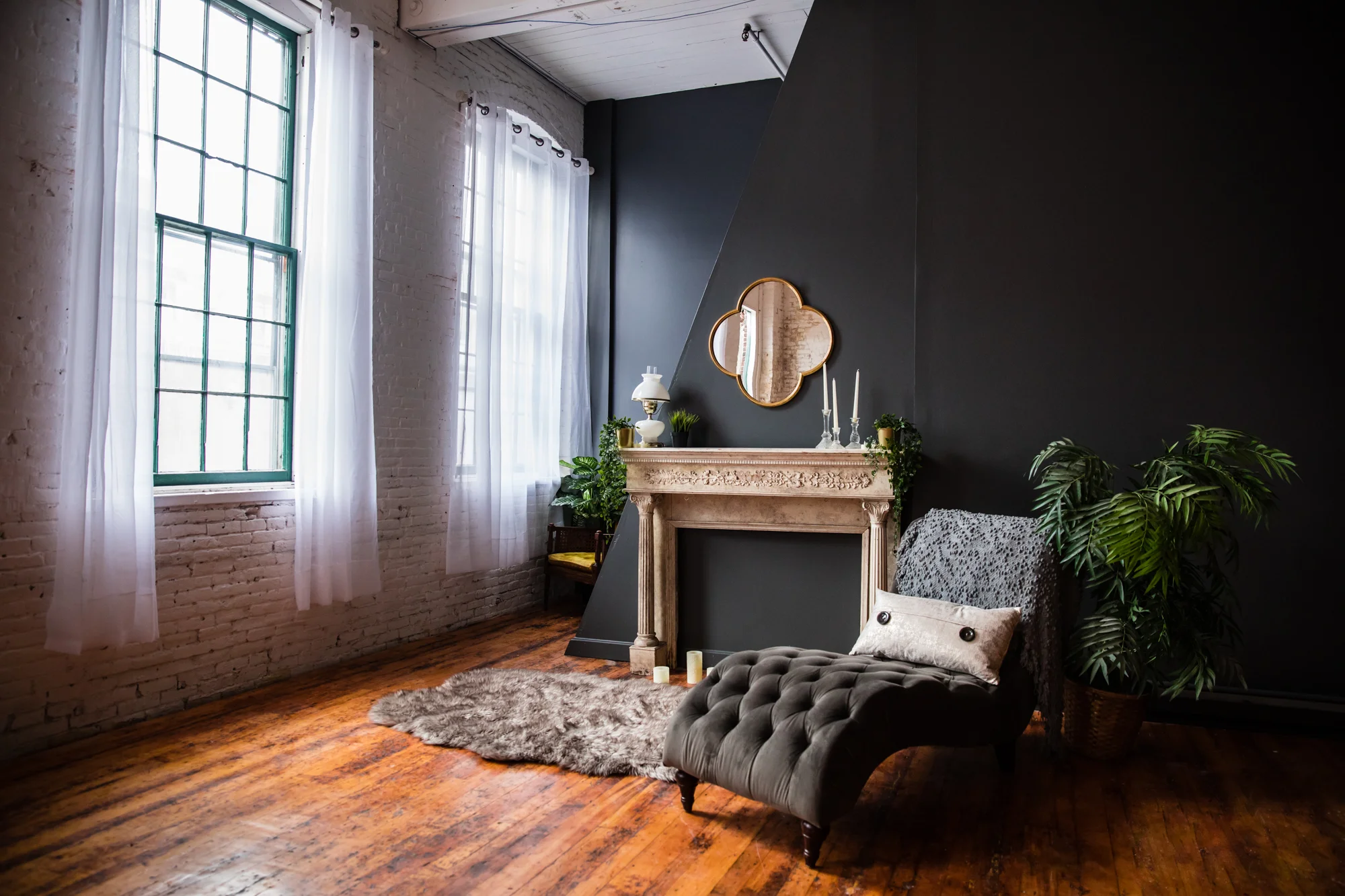 Our Studio is located in Clinton MA, is about 850 sqft, and has many furniture and styling options!