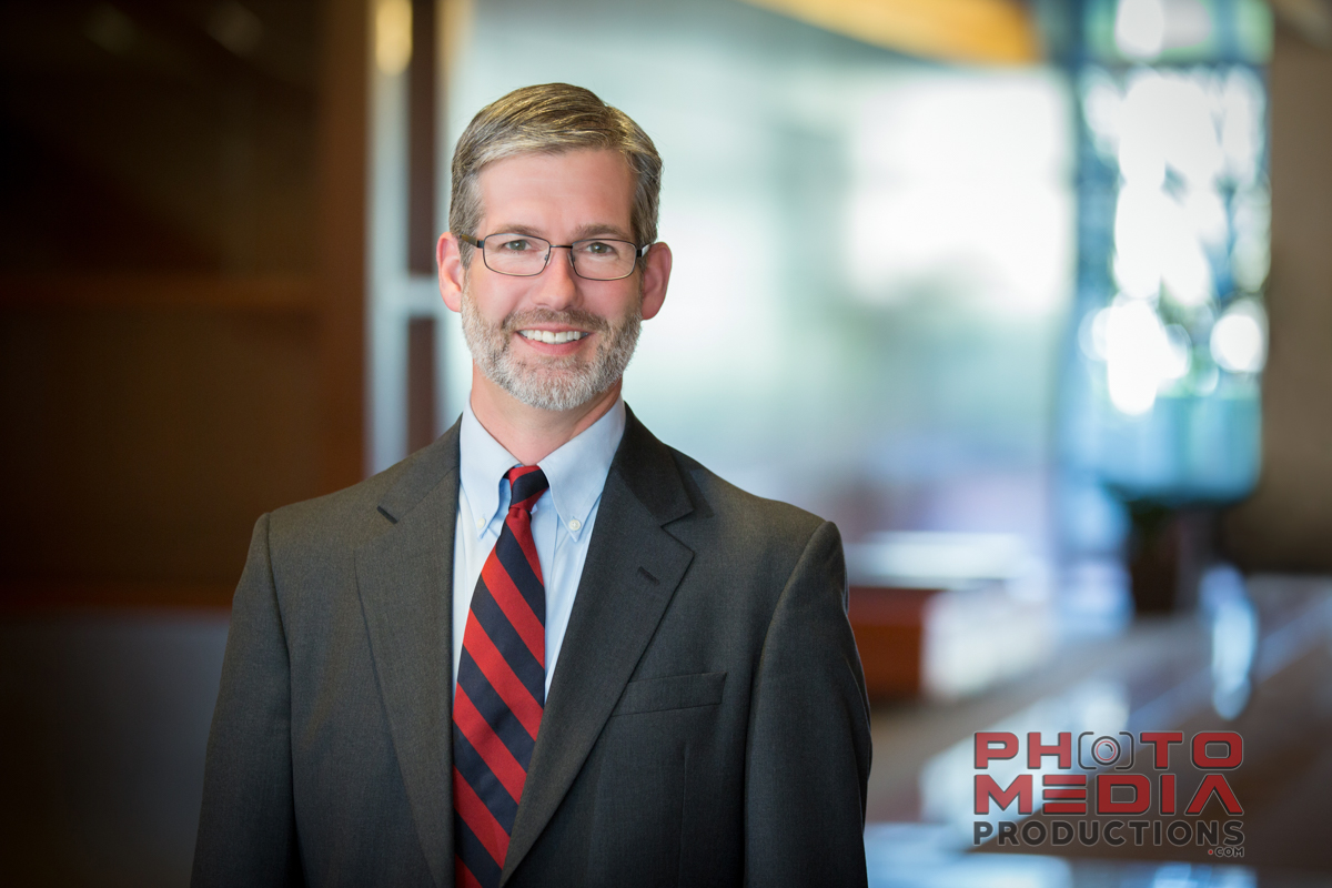 Litigator Joe Carlisle is a shareholder at Buckley Law, who's primary focus is on business disputes, securities litigation, employment litigation, healthcare matters, breach of contract and fraud claims. He is dressed to convey business, looks experienced enough to mean business, and yet his smile is still pleasant enough to say "I am great to work with."