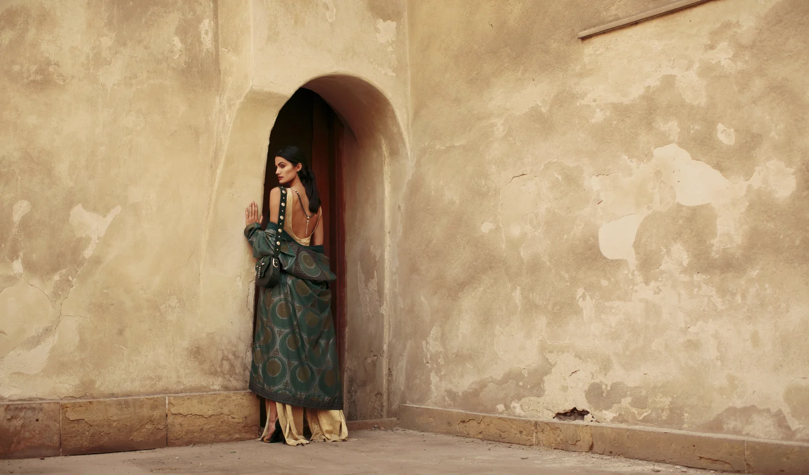 Published in Vogue Arabia Model: Tara Emad Styling: Lorand Lajos Studded Green bag : Okhtein Winter 17 Coat : Mix and Match Pendant: Azza Fahmy Production: Maison Pyramide Photography and Art Direction: Bassam Allam Location: Beit Al Suhaimy, Cairo, Egypt