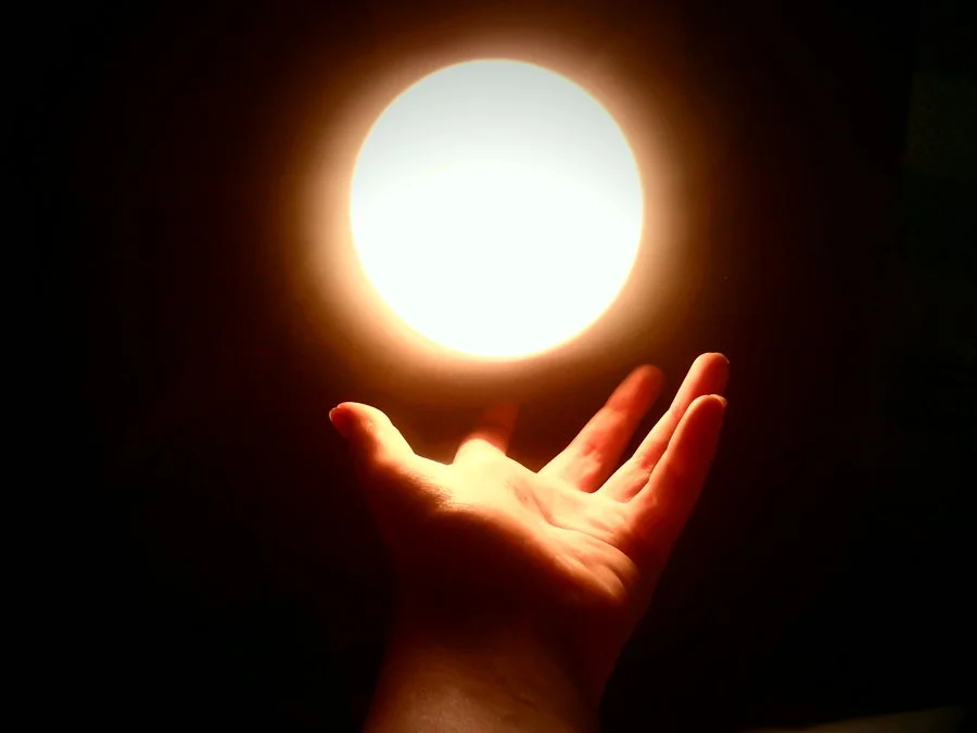 The Light of the World (Sun, Hand)