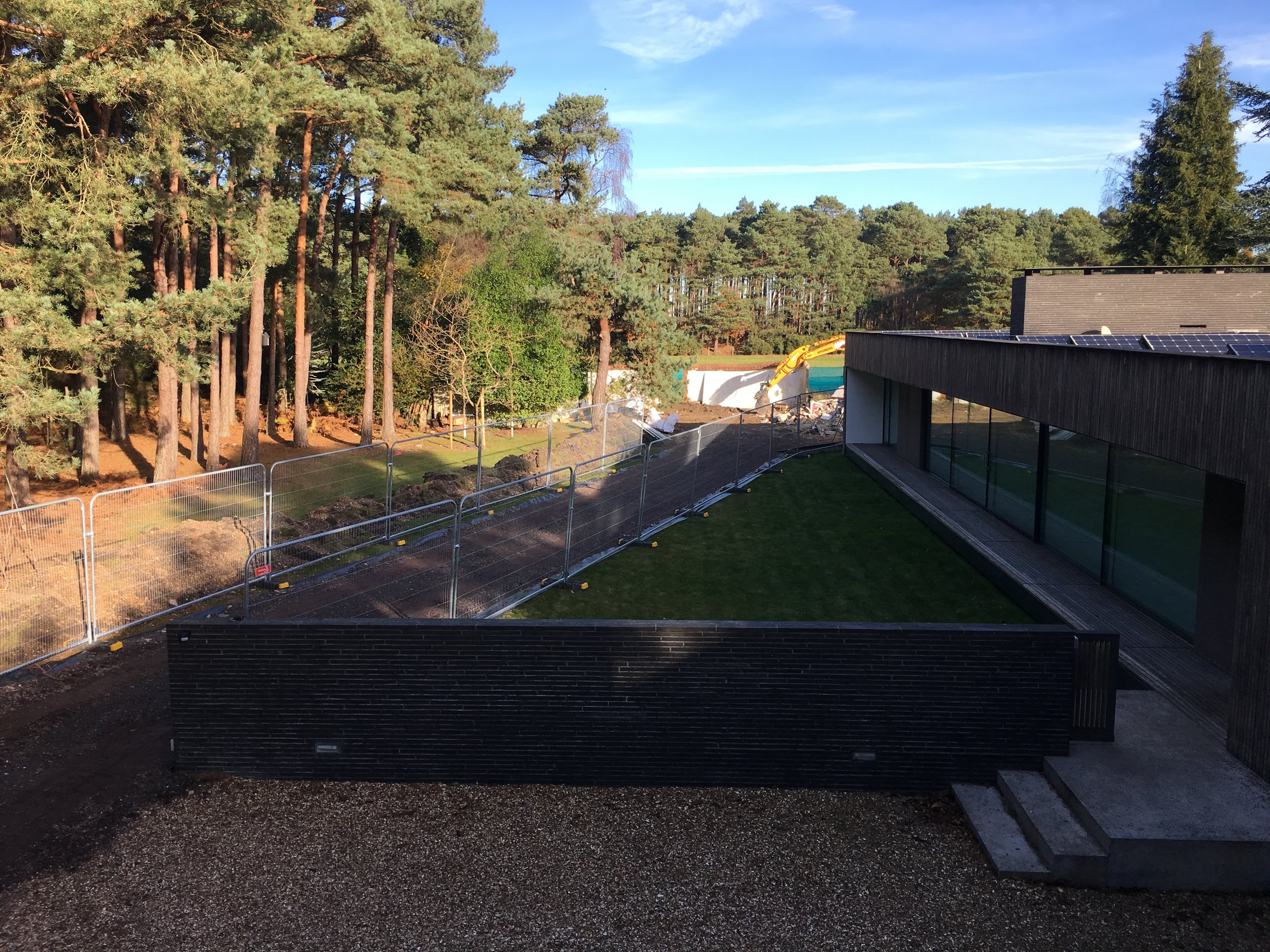 Demolition of the annexe and installation of a temporary road which spoils the lawn and view from the house somewhat. 