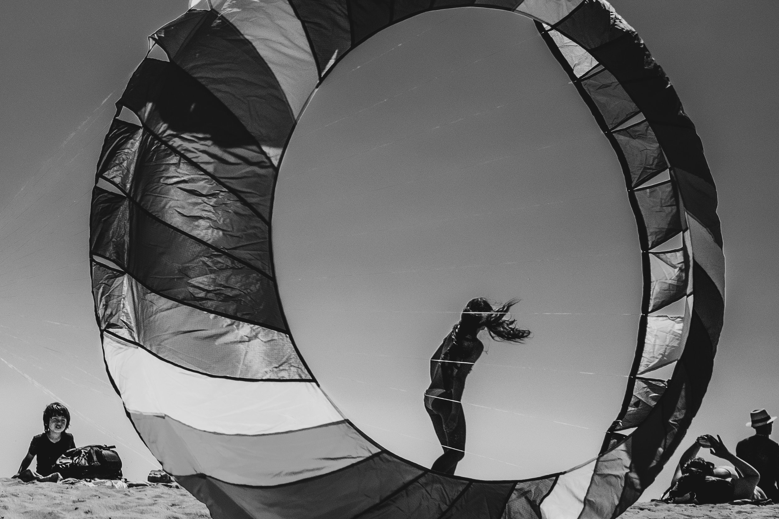Woman inside a circular kite, Venice Beach