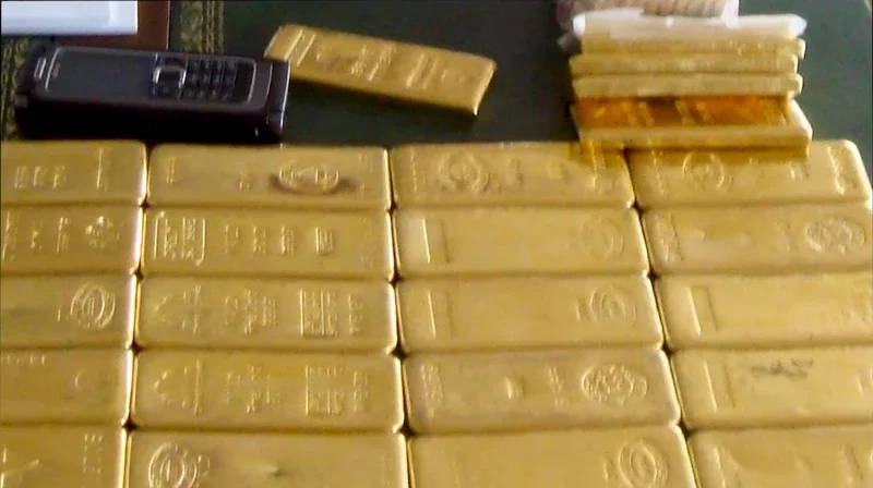 Old photograph of goldbars on the table