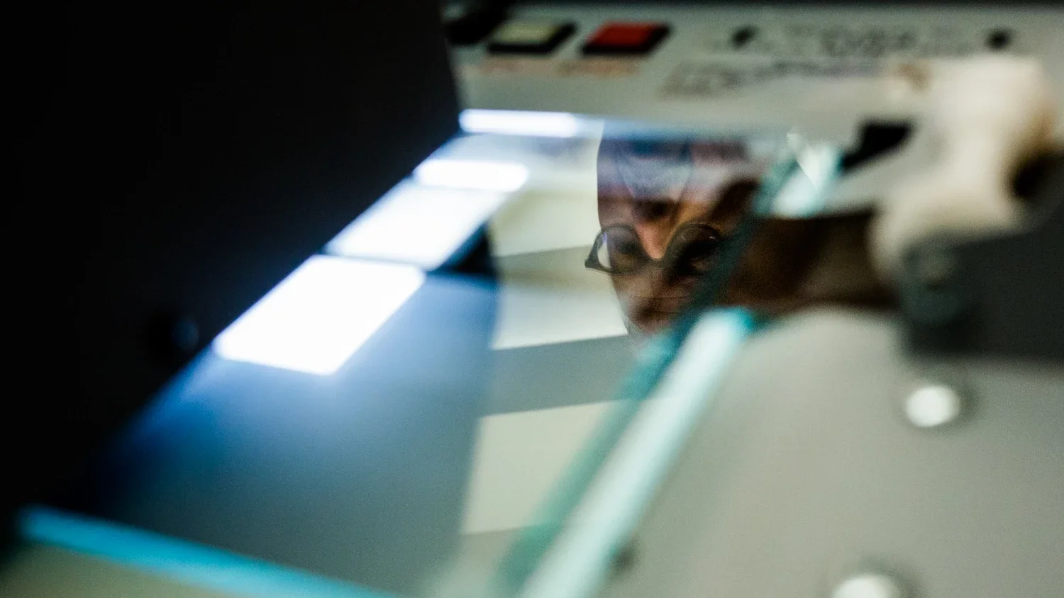 Jim Heimann's reflection from the microfiche machine